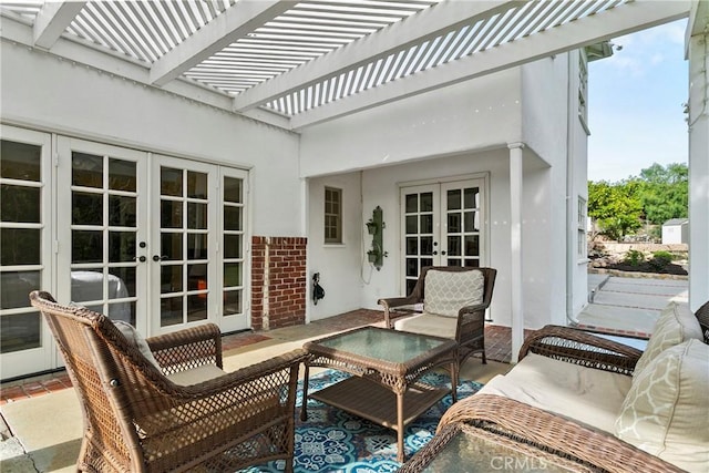 view of patio featuring french doors and a pergola