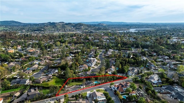 drone / aerial view featuring a mountain view and a residential view