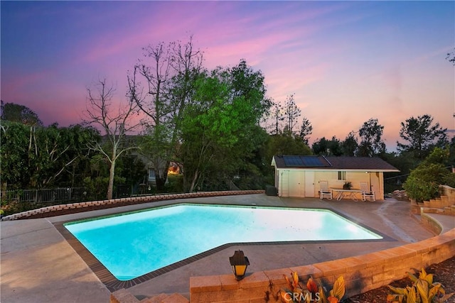 view of pool featuring outdoor dry bar, a fenced in pool, a patio, and fence