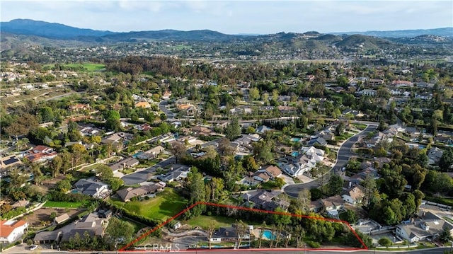 bird's eye view featuring a mountain view and a residential view