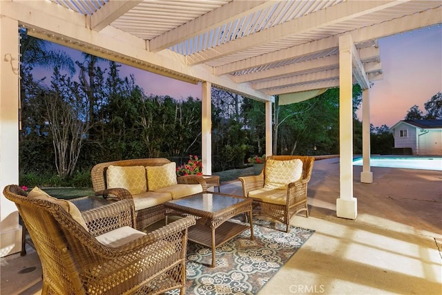 view of patio with an outdoor living space, an outdoor pool, and a pergola