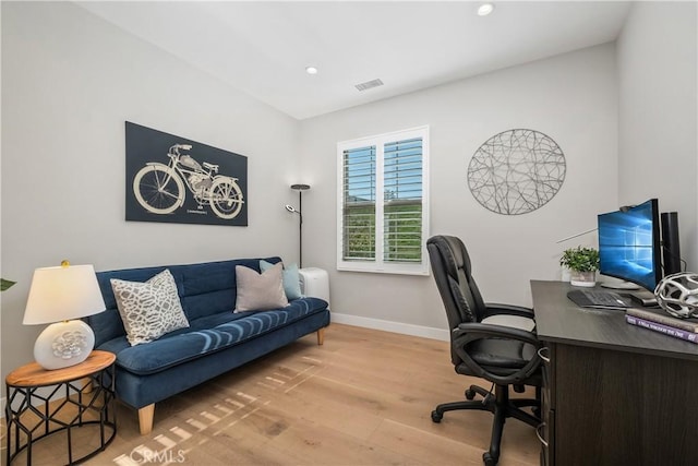 office with recessed lighting, visible vents, baseboards, and light wood finished floors