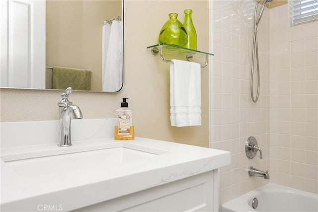 bathroom featuring vanity and shower / tub combo