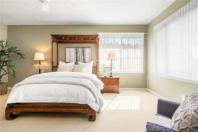 bedroom with carpet flooring, ceiling fan, and baseboards