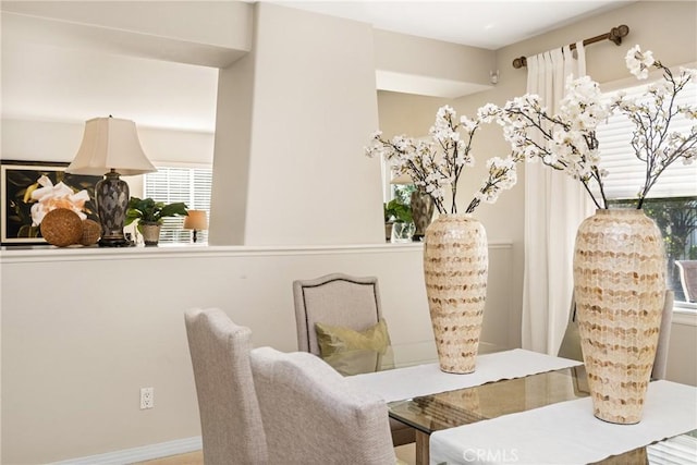 dining room featuring baseboards