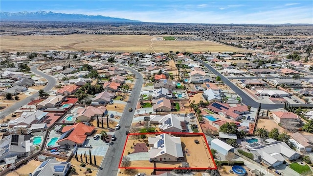 bird's eye view featuring a mountain view and a residential view