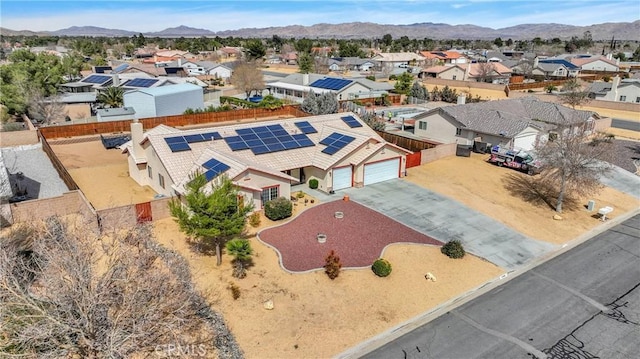 bird's eye view with a mountain view and a residential view