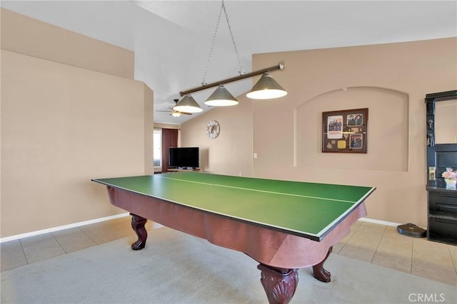 game room with baseboards and tile patterned flooring