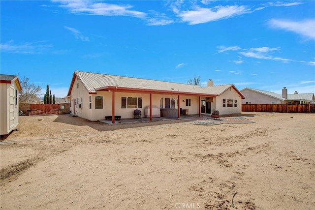 20368 Majestic Dr, Apple Valley, CA 92308 - back of property featuring a patio, a tile roof, a fenced backyard, and stucco siding