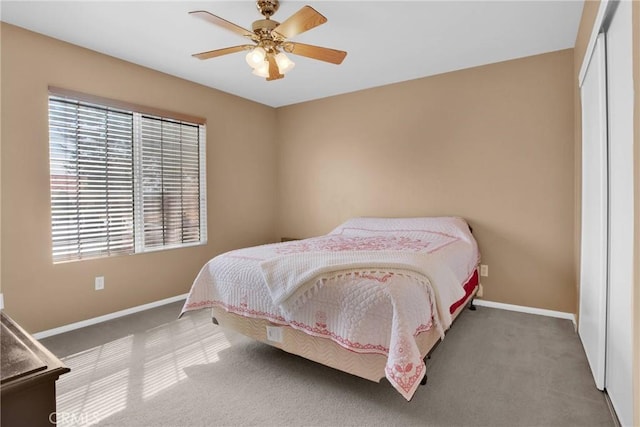 20368 Majestic Dr, Apple Valley, CA 92308 - bedroom featuring baseboards, carpet floors, a closet, and a ceiling fan