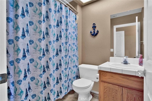 20368 Majestic Dr, Apple Valley, CA 92308 - bathroom featuring vanity, toilet, and a shower with shower curtain