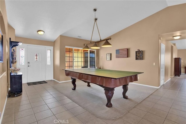 game room with tile patterned floors, baseboards, lofted ceiling, and a wealth of natural light