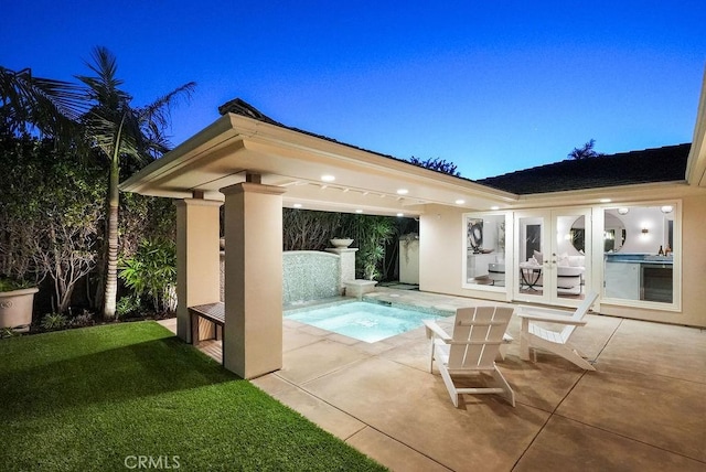 view of pool featuring a lawn, french doors, a hot tub, and a patio