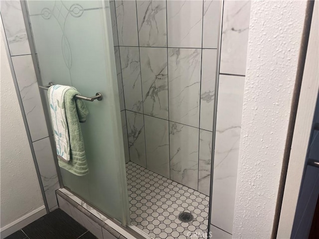 bathroom featuring a stall shower