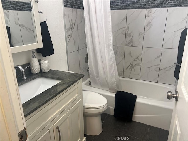 full bath with vanity, toilet, and shower / tub combo