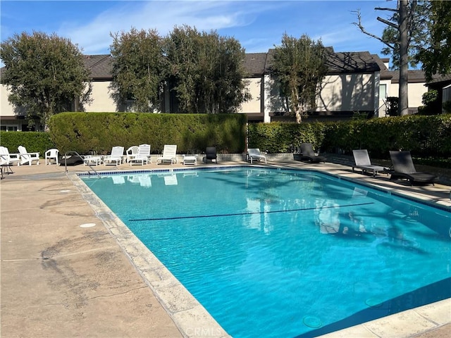 community pool featuring a patio