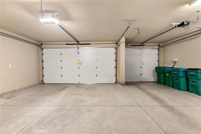 garage featuring a garage door opener