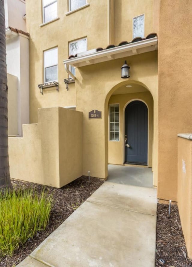 2203 Huntington Point Dr Unit 4, Chula Vista, CA 91914 - entrance to property featuring stucco siding
