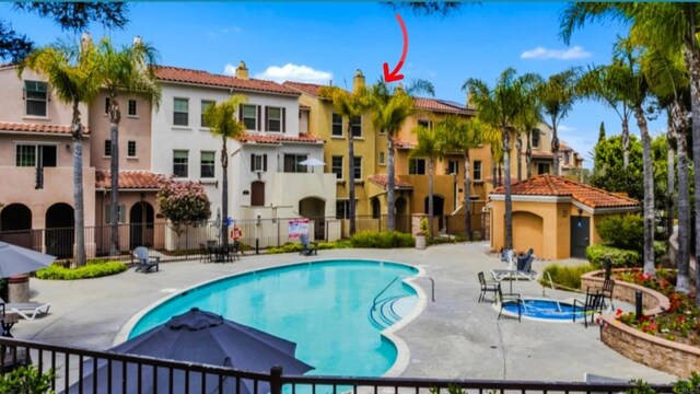 2203 Huntington Point Dr Unit 4, Chula Vista, CA 91914 - community pool featuring a patio