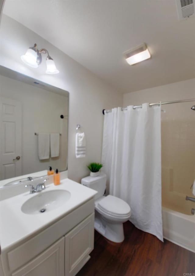 2203 Huntington Point Dr Unit 4, Chula Vista, CA 91914 - full bathroom with wood finished floors, vanity, toilet, and shower / tub combo