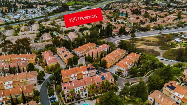 2203 Huntington Point Dr Unit 4, Chula Vista, CA 91914 - aerial overview of property's location with nearby suburban area