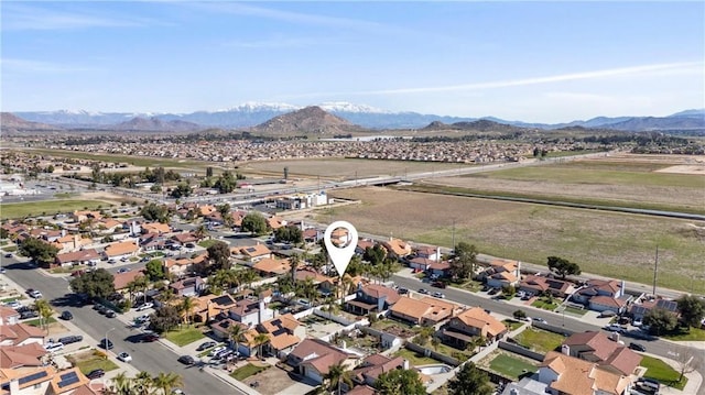 aerial view featuring a residential view and a mountain view