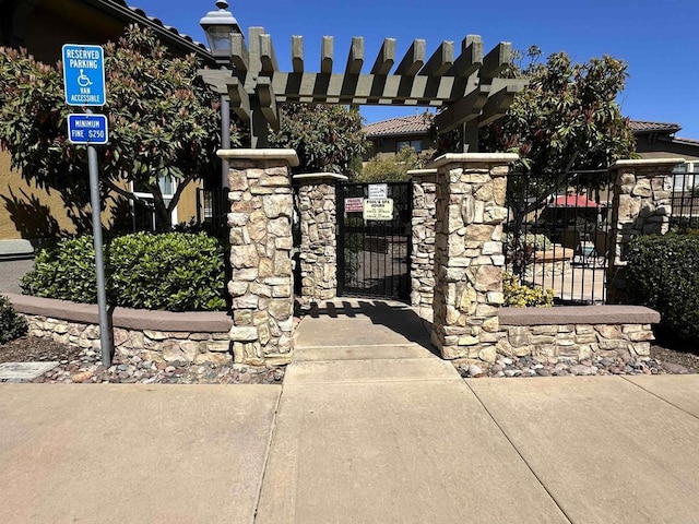 view of front of home featuring a gate and fence