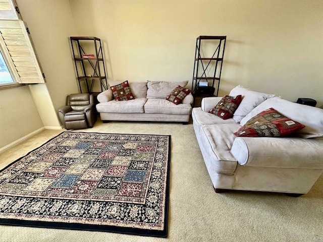 living room with carpet flooring and baseboards