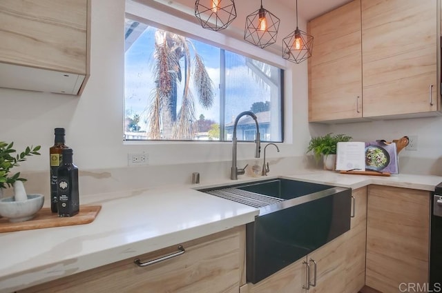 4197 Tiberon Dr, Oceanside, CA 92056 - kitchen with a sink, pendant lighting, and light brown cabinetry