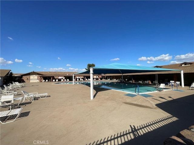 pool with a patio