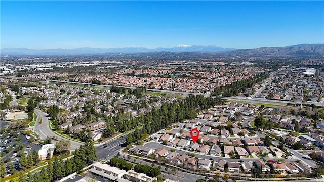 drone / aerial view with a mountain view and a residential view