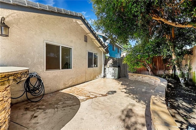 view of patio / terrace with fence