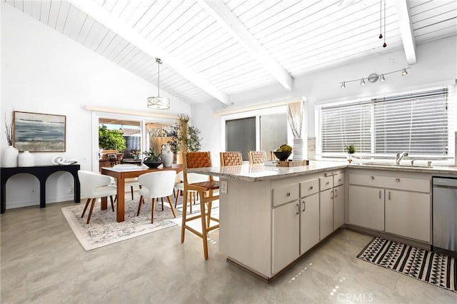 kitchen featuring a peninsula, a sink, hanging light fixtures, dishwasher, and beamed ceiling