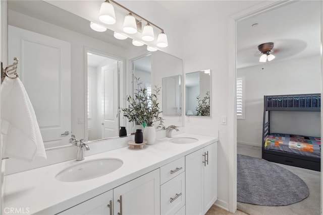 full bath with a sink and double vanity