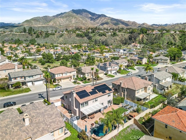 birds eye view of property featuring a residential view and a mountain view