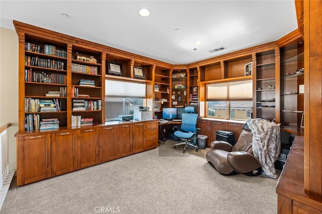 office space featuring recessed lighting, light colored carpet, and visible vents