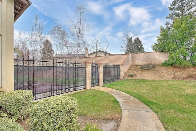 view of yard with a gate and fence