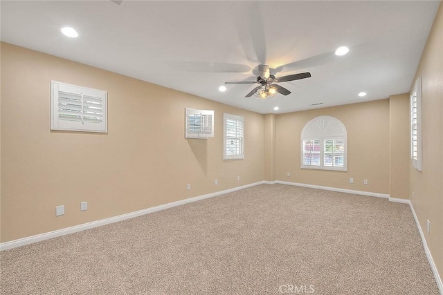 unfurnished room featuring recessed lighting, baseboards, carpet, and ceiling fan