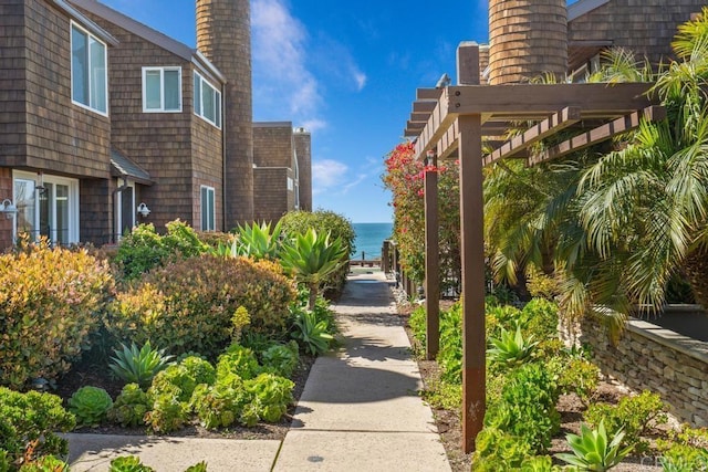 view of property's community with a pergola