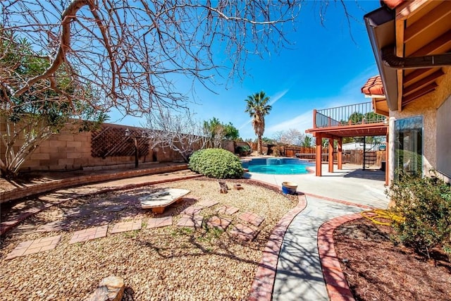 view of yard with a patio, stairway, a fenced in pool, a fenced backyard, and a deck