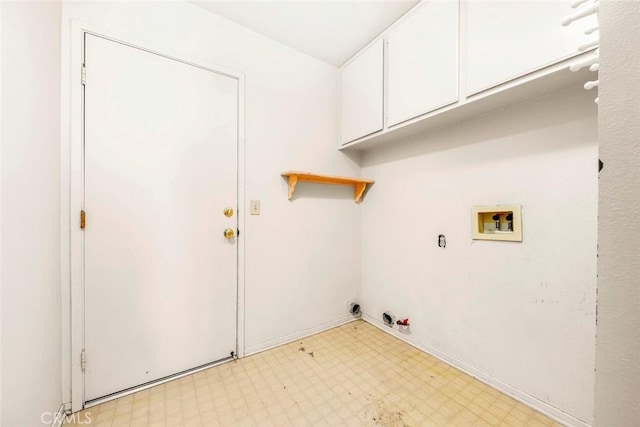 laundry room featuring cabinet space, light floors, gas dryer hookup, and washer hookup