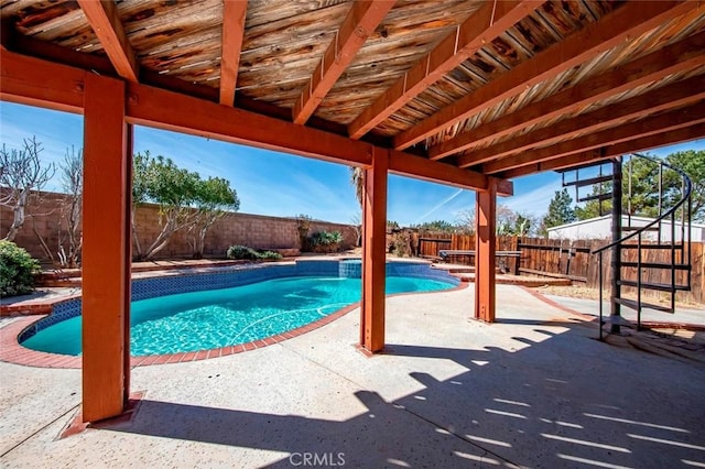 view of pool with a fenced in pool, a patio, and a fenced backyard