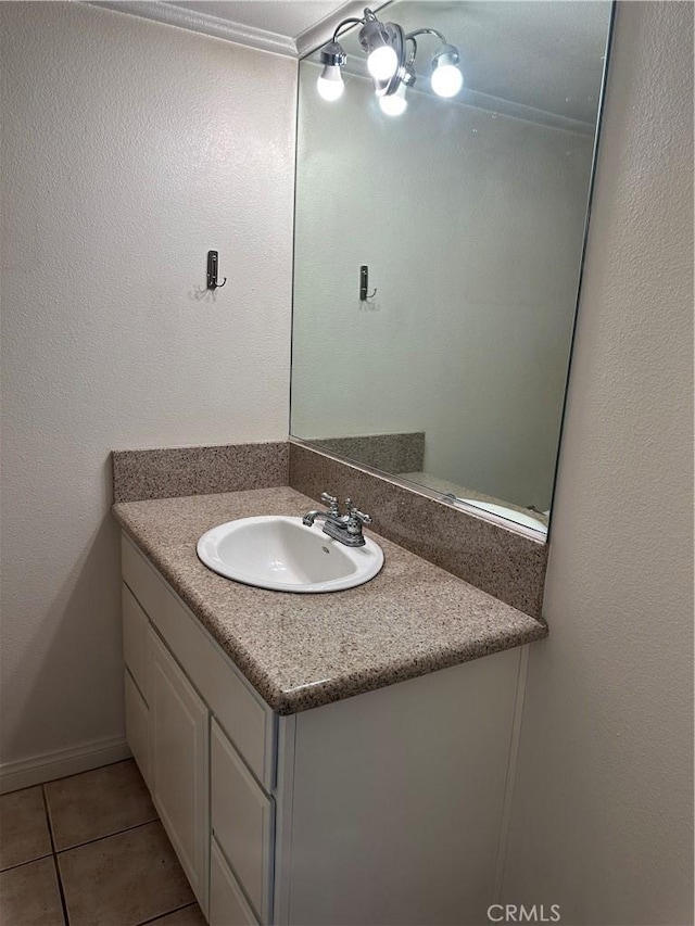 bathroom featuring tile patterned floors and vanity