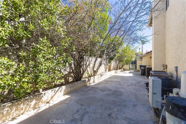 view of patio / terrace featuring fence