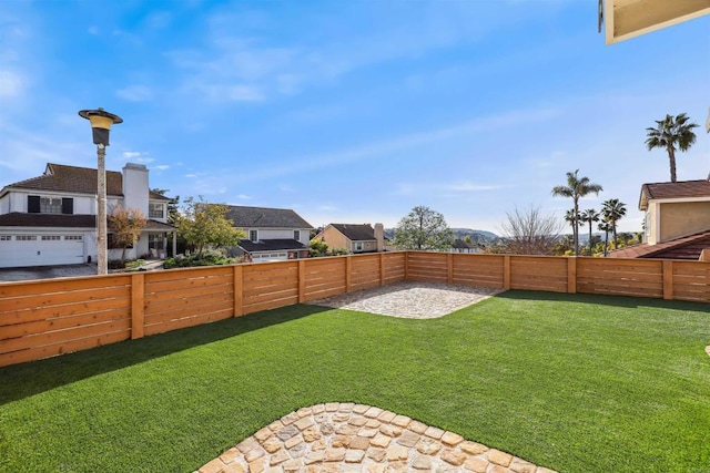 view of yard featuring a fenced backyard