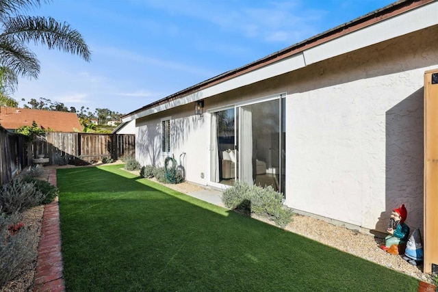 view of yard featuring a fenced backyard