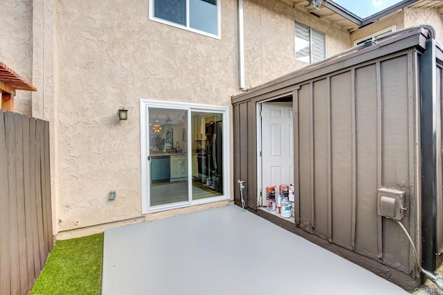 view of patio with fence