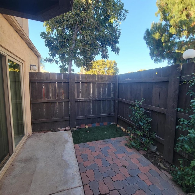 view of patio with a fenced backyard