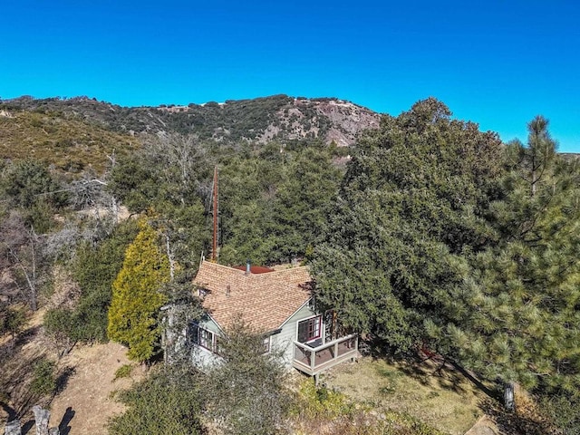 property view of mountains with a wooded view