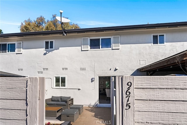 exterior details featuring stucco siding